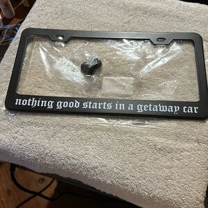 “Nothing good starts in a getaway car” humorous car tag holder
